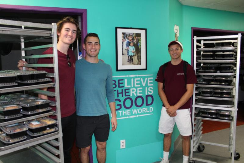 John, Stephen, and Nick dropping off food donations at SFC!